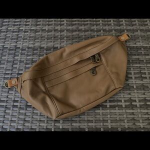 Parker Thatch Cross your heart sling in luggage